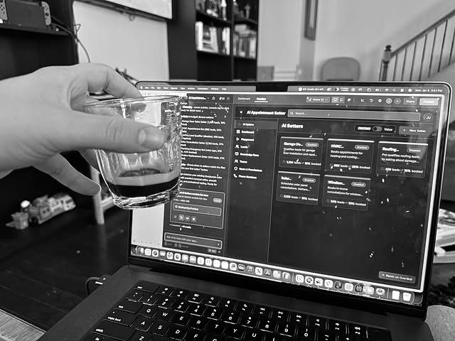 Late-night analytics with a glass in hand